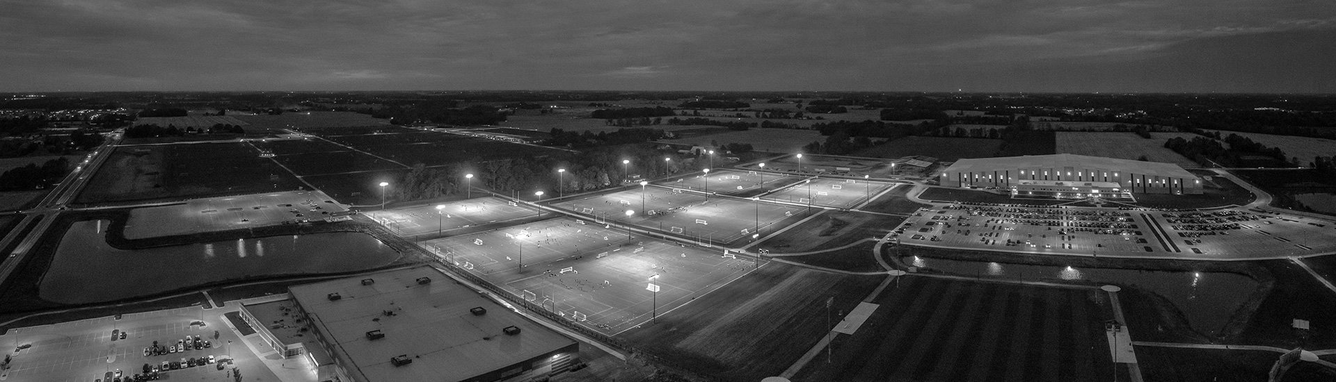 Aerial view of Droplight Grand Park Sports Campus showing fields, diamonds and the events center